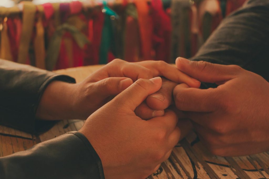 close up shot of a holding hands