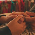 close up shot of a holding hands